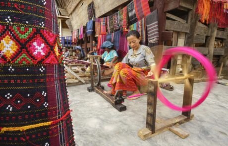 ulos weaving Huta Raja Samosir, Ulos weaving village, Batak Toba culture, Samosir Island attractions, Lake Toba cultural tourism, traditional Batak houses, things to do in Samosir Island, North Sumatra cultural tours